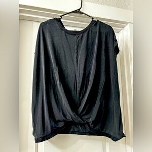 Black time and true t shirt with criss cross detail in the front. Size XXL.